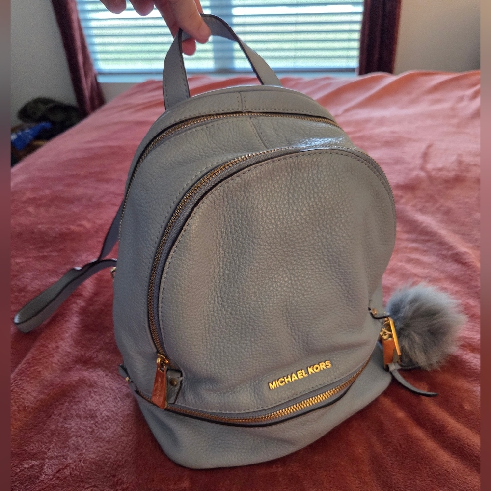 Michael Kors Sky Blue Backpack with Gold Accents